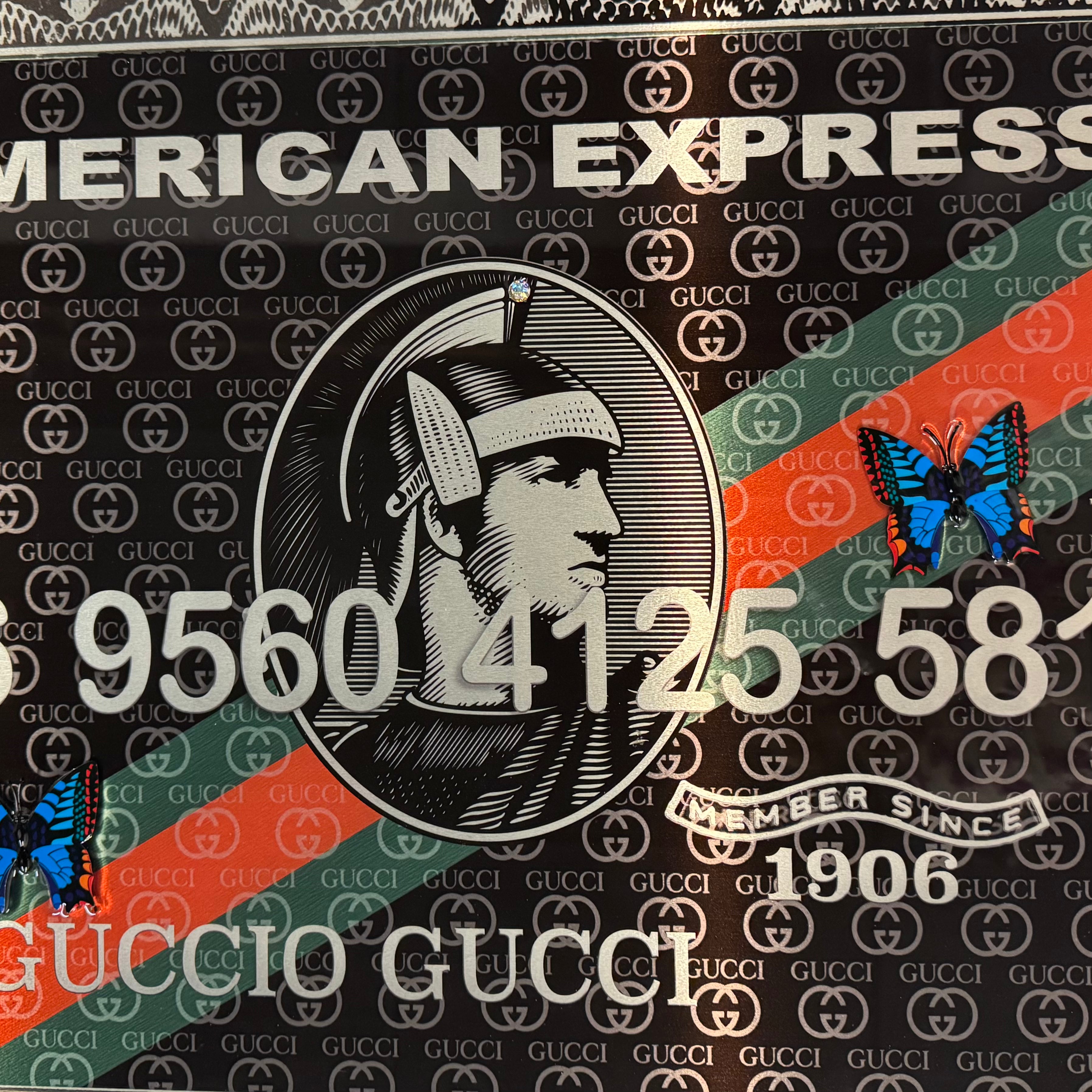 Van Apple Art American Express card Gucci close up