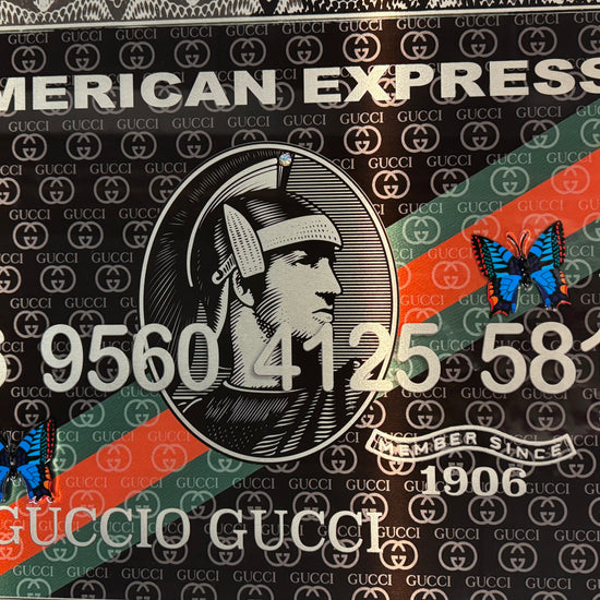 Van Apple Art American Express card Gucci close up